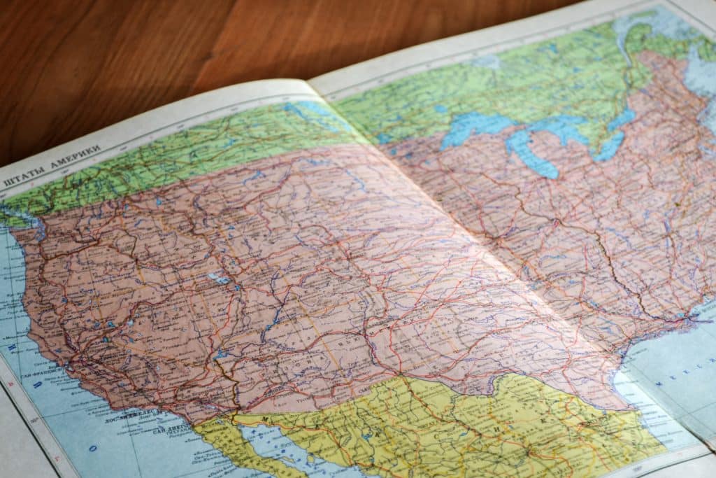 A close-up of a map showing the United States with state borders and major roads.