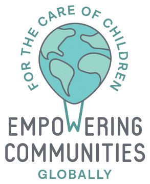 A globe-shaped balloon with the text: For the Care of Children, Empowering Communities Globally.